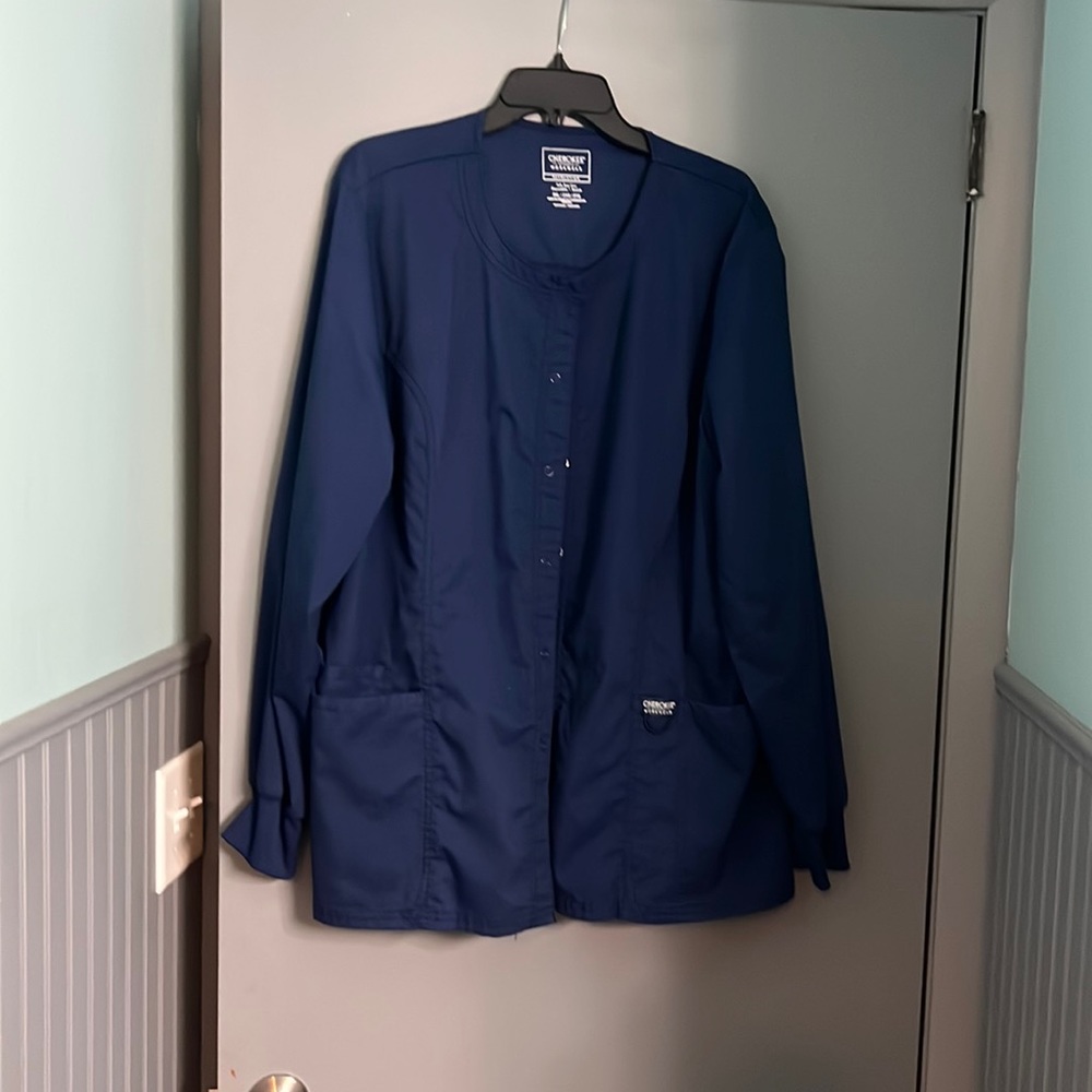 Size 2X Cherokee navy blue scrub jacket.